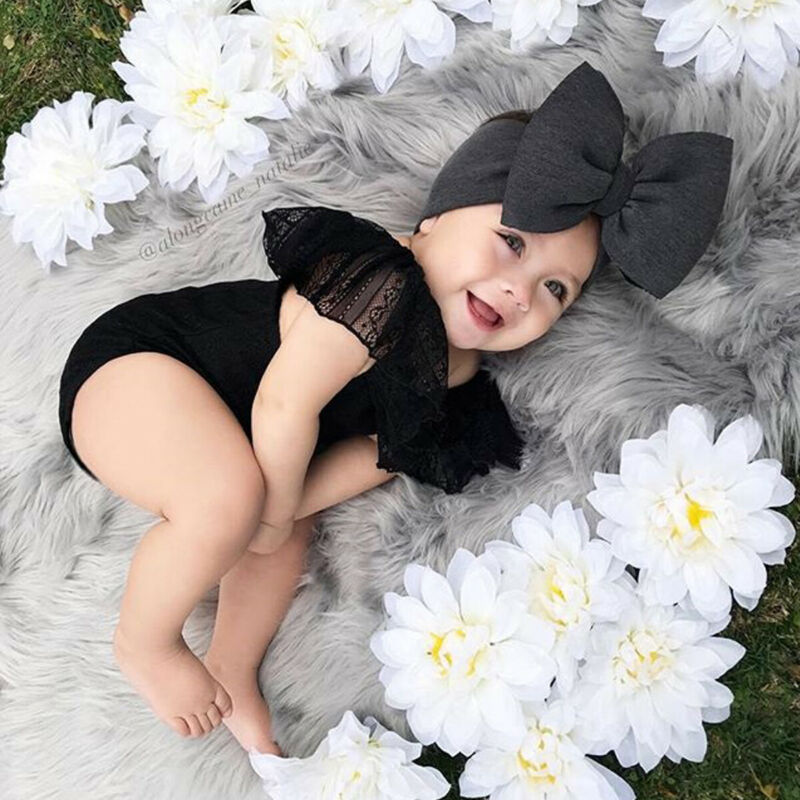 Baby girl shops outfits with headbands